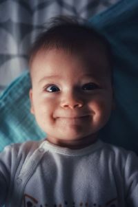 Portrait of cute baby boy smiling