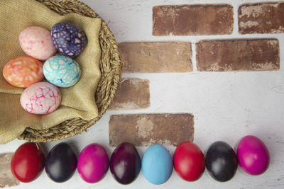 Multi colored easter eggs on wall