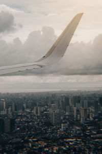 Aerial view of cityscape against sky