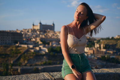 Portrait of young woman looking away