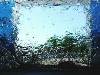 Close-up of water drops on glass