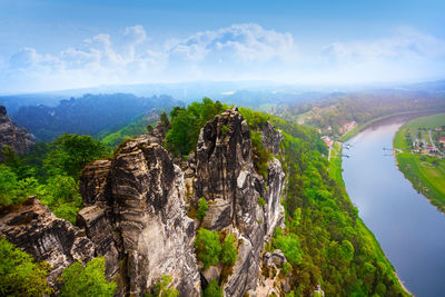 Panoramic view of mountain against cloudy sky