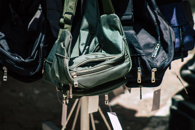Close-up of clothes hanging on seat