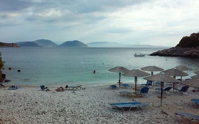 Scenic view of sea against cloudy sky
