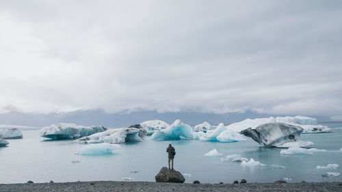 Scenic view of frozen sea against sky