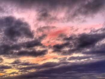 Low angle view of dramatic sky during sunset