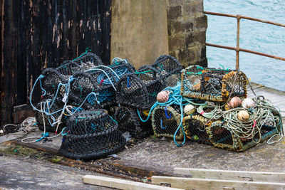 Close-up of fishing nets on promenade
