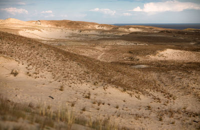 Scenic view of desert against sky