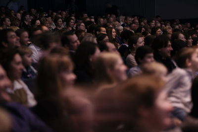 People sitting in auditorium 