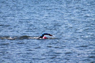 Person swimming in river