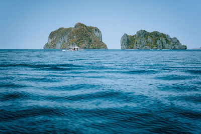 Scenic view of sea against clear sky