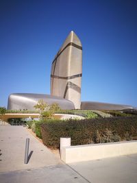 Low angle view of building against blue sky