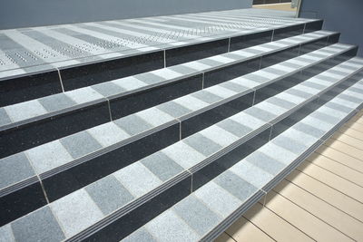 High angle view of tiled floor by building