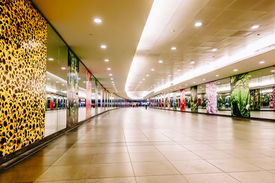 Illuminated underground walkway in airport