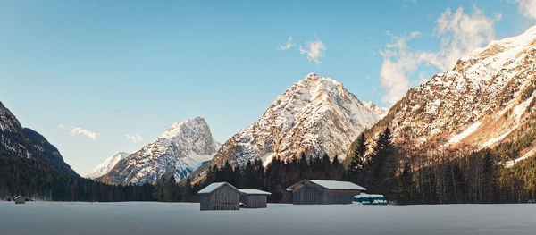 Scenic view of snowcapped mountains against sky