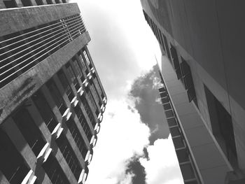 Low angle view of modern buildings against sky