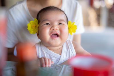 Portrait of cute baby at home