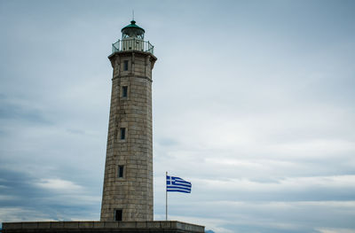 Low angle view of clock tower against sky