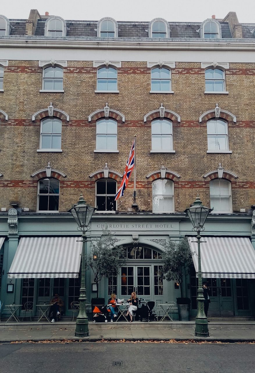 architecture, flag, building exterior, built structure, building, window, patriotism, day, outdoors, city, no people