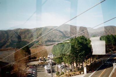 Road in city against sky