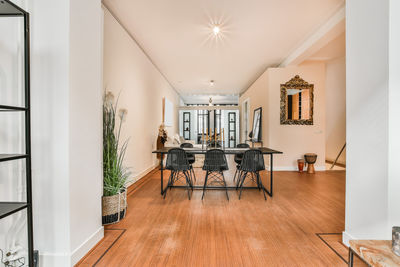 Empty chairs and tables on floor at home