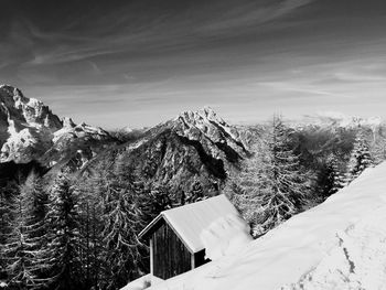 Scenic view of snow covered mountain against sky