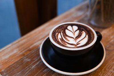 Close-up of cappuccino on table