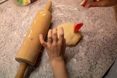 High angle view of person preparing food at home