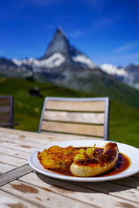 Rosti sausage swiss cuisine with matterhorn