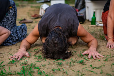 Close-up of man lying down outdoors