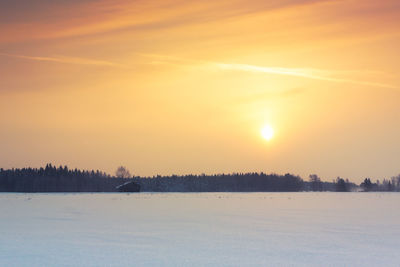 Scenic view of landscape at sunset