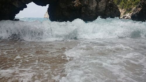 Waves splashing on rocks