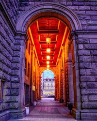 Empty corridor along buildings