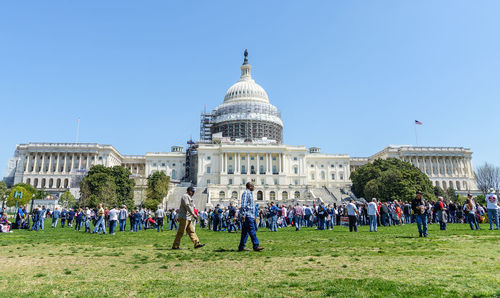 People at us state capitol building