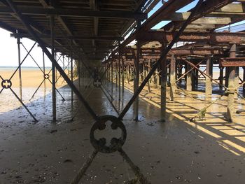View of metallic bridge over sea