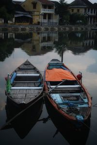 Boat moored in lake