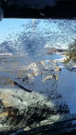 High angle view of puddle on shore