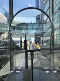 Buildings seen through magnifying glass