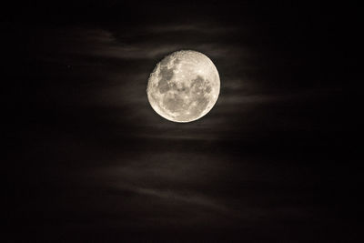 Low angle view of moon against sky at night