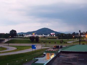 View of road against cloudy sky