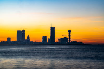 Scenic view of sea against sky during sunset