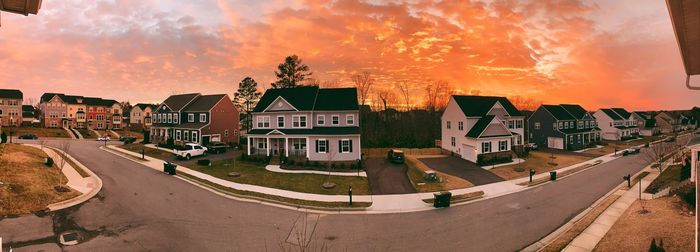 High angle view of buildings against sky during sunset