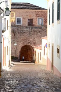 Footpath leading towards houses in town