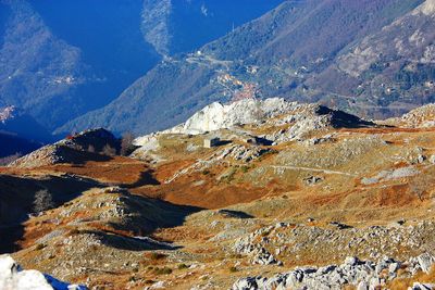 Rock formations in mountains against sky