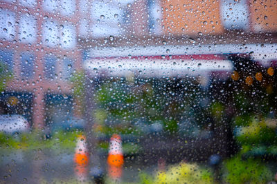 Full frame shot of wet window in rainy season