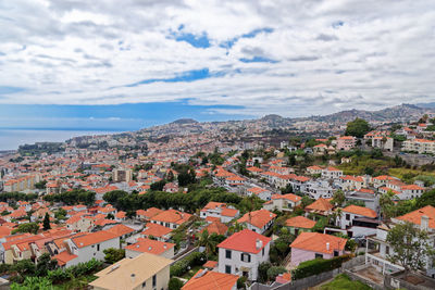 High angle shot of townscape against sky, funchal, madeira