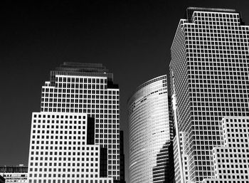 Low angle view of skyscrapers against sky