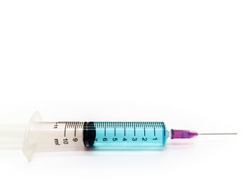 Close-up of pencil over white background
