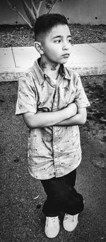 Portrait of smiling girl standing outdoors