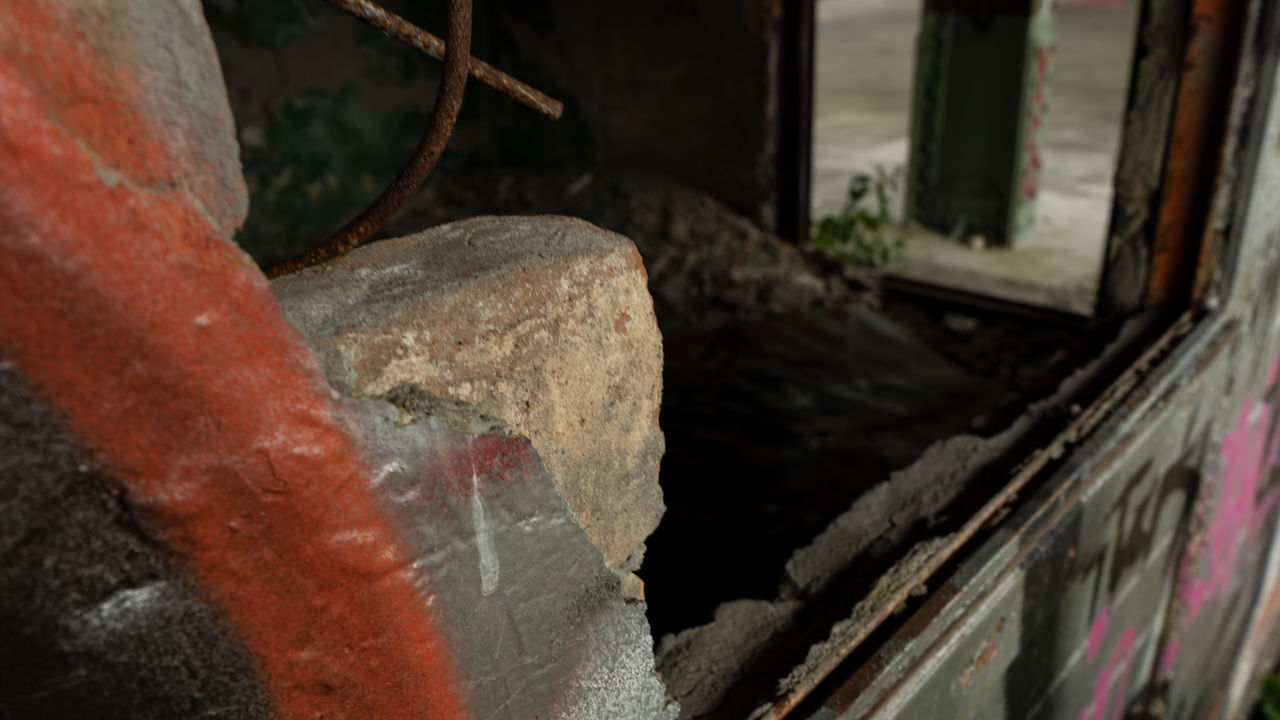 HIGH ANGLE VIEW OF RUSTY WINDOW